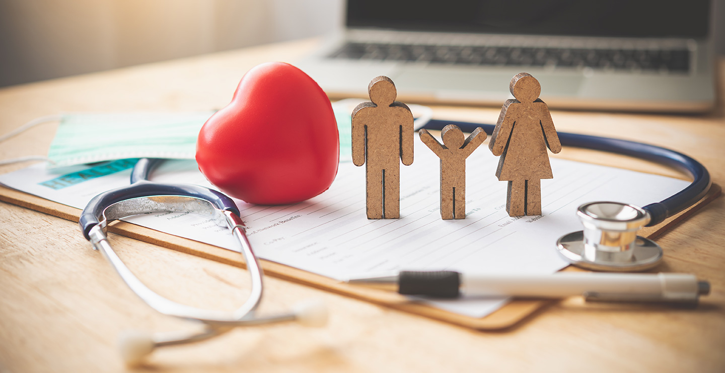 Paperwork, medical equipment, and a family represent the NJ IVF mandate
