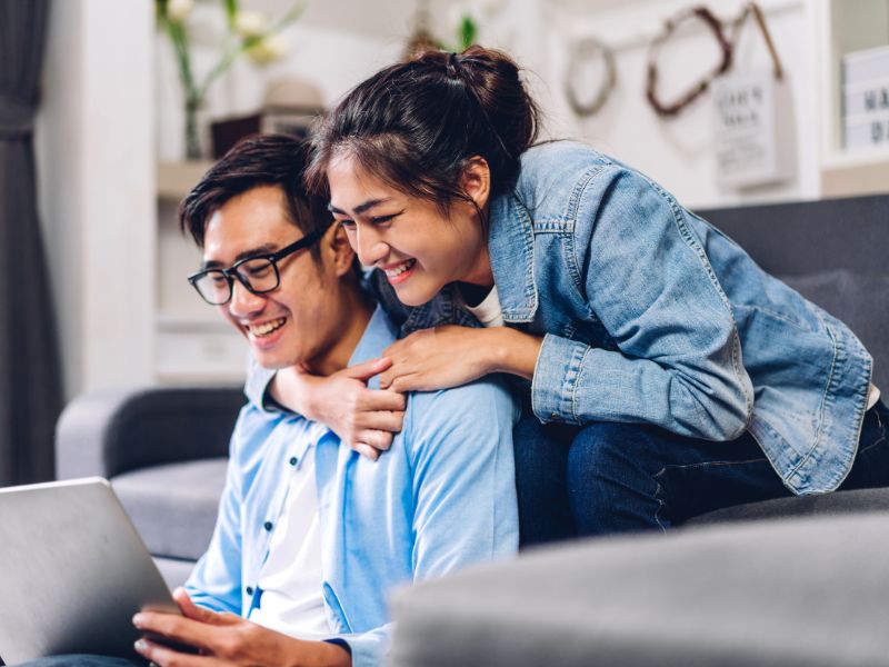 asian couple researching fertility options